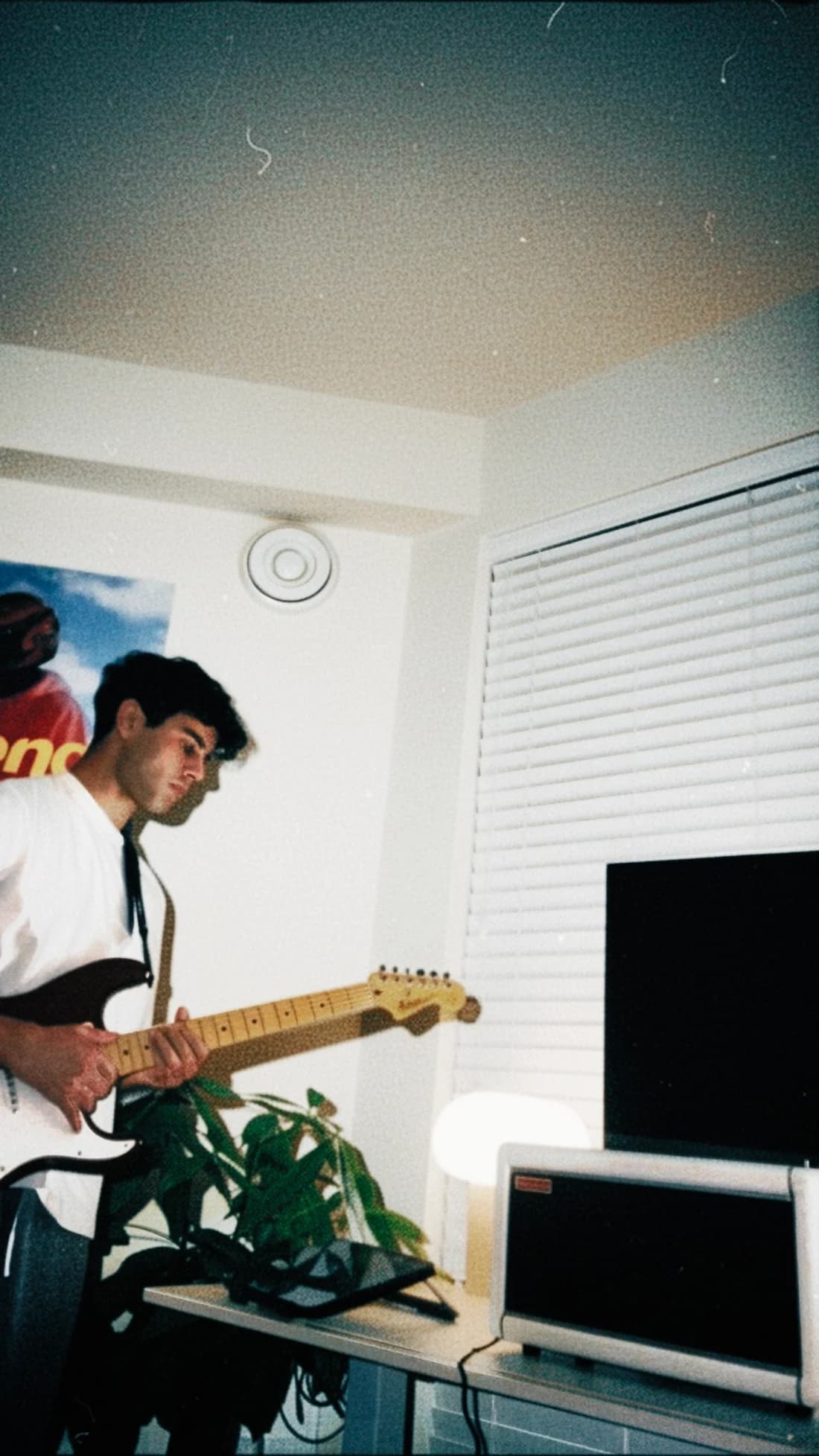 Playing an electric guitar at home